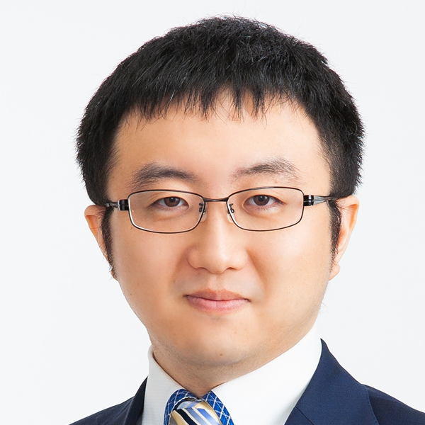 塚田 義典氏